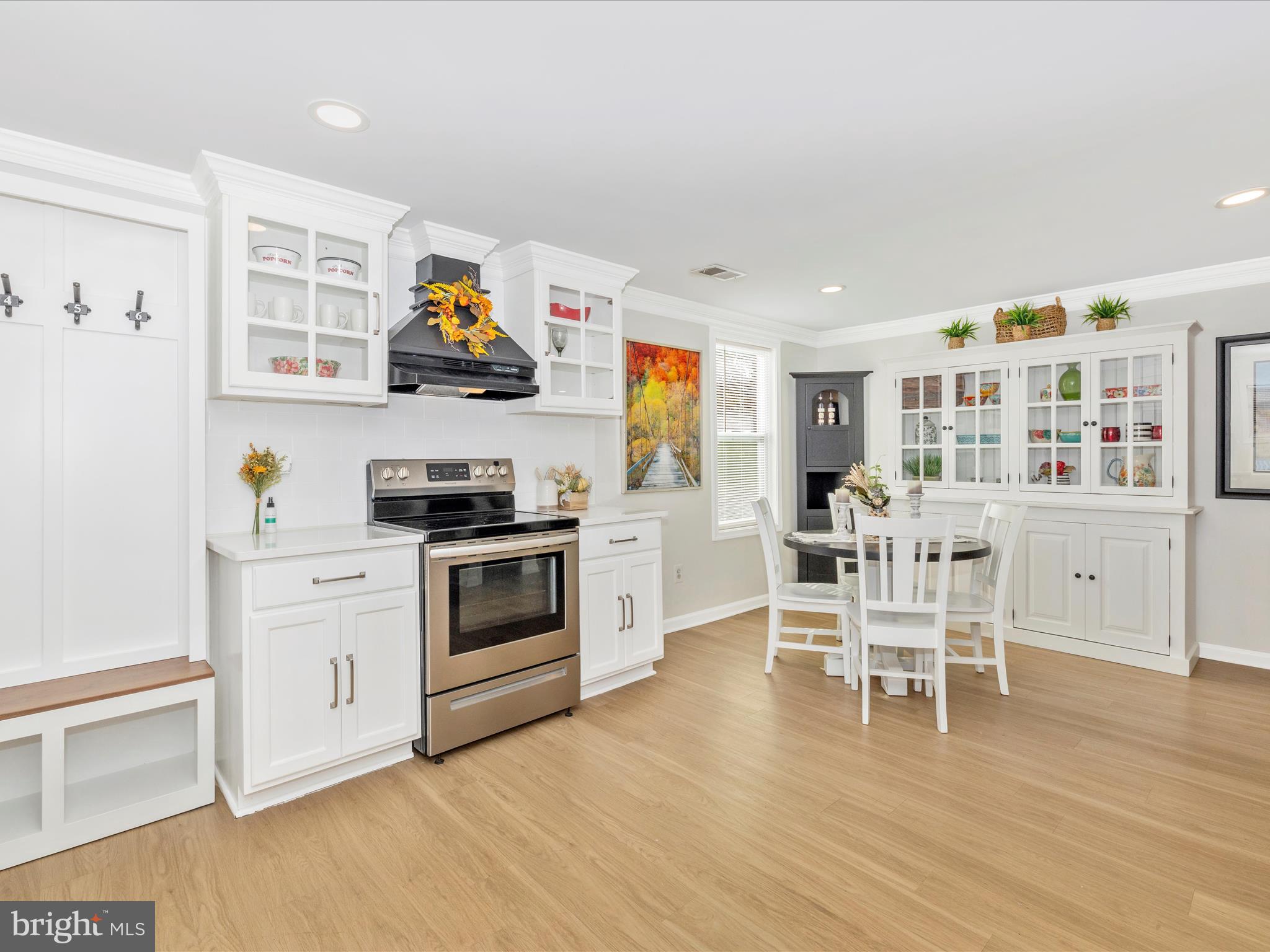 1410 Woodenbridge Lane Mount Airy, MD 21771 - Photo 16 of 50 a kitchen with stainless steel appliances granite countertop a stove and cabinets