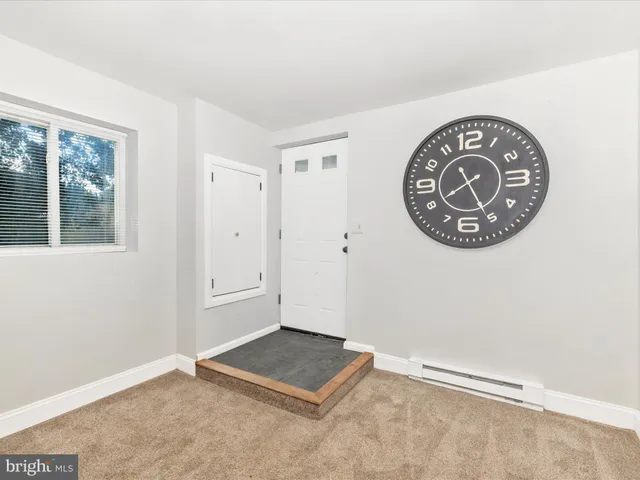 a view of a hallway with entryway