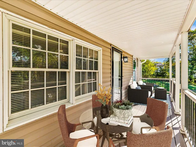 a outdoor living space with furniture and garden view