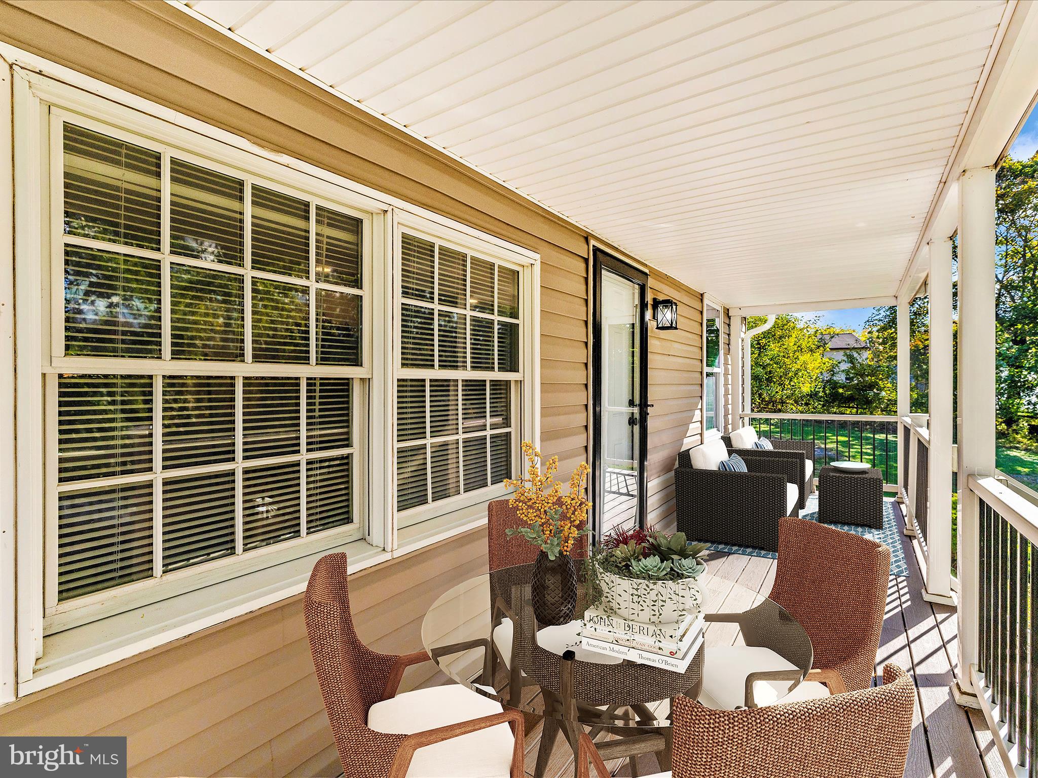 1410 Woodenbridge Lane Mount Airy, MD 21771 - Photo 3 of 50 a outdoor living space with furniture and garden view