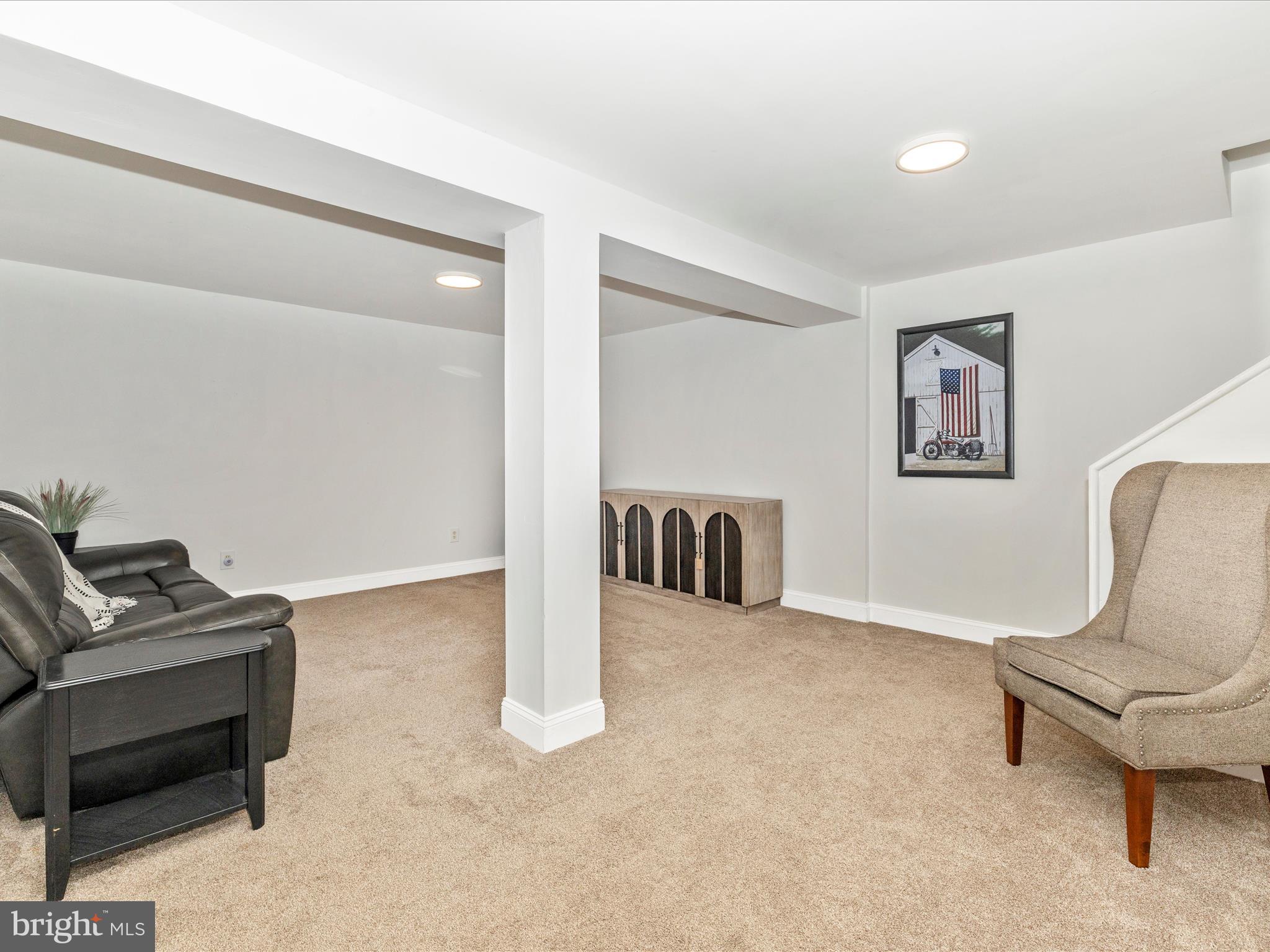 1410 Woodenbridge Lane Mount Airy, MD 21771 - Photo 31 of 50 a living room with furniture
