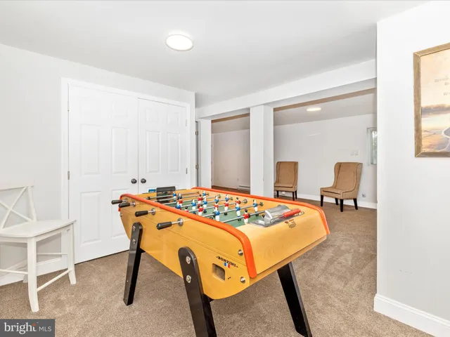 a bedroom with bed and a window