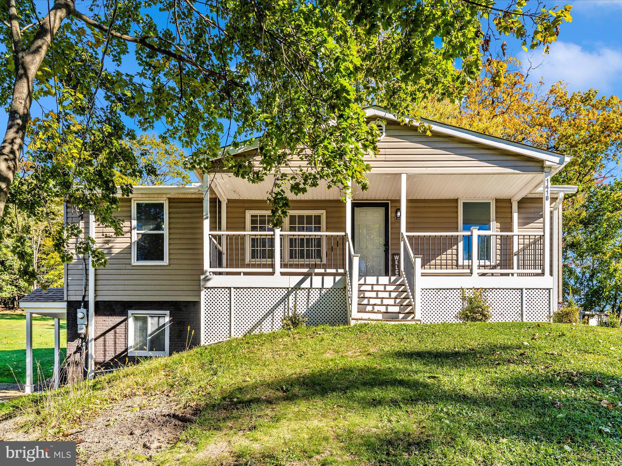 1410 Woodenbridge Lane Mount Airy, MD 21771 - Photo 40 of 50 a view of house with yard