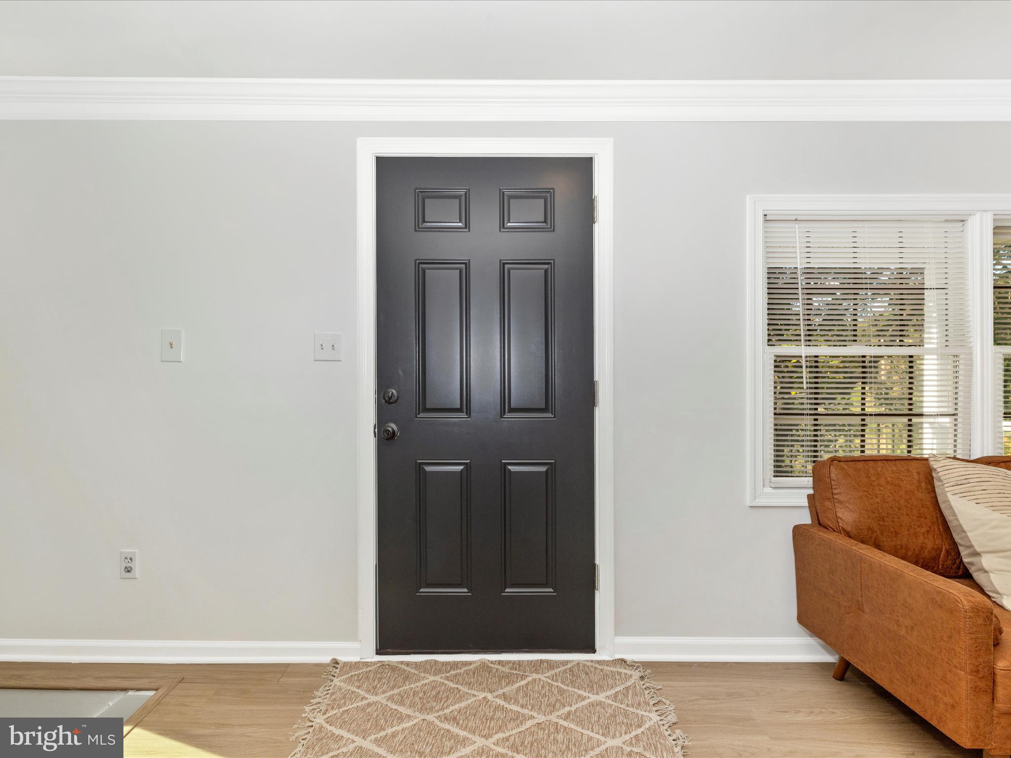 1410 Woodenbridge Lane Mount Airy, MD 21771 - Photo 4 of 50 a living room with furniture and a window