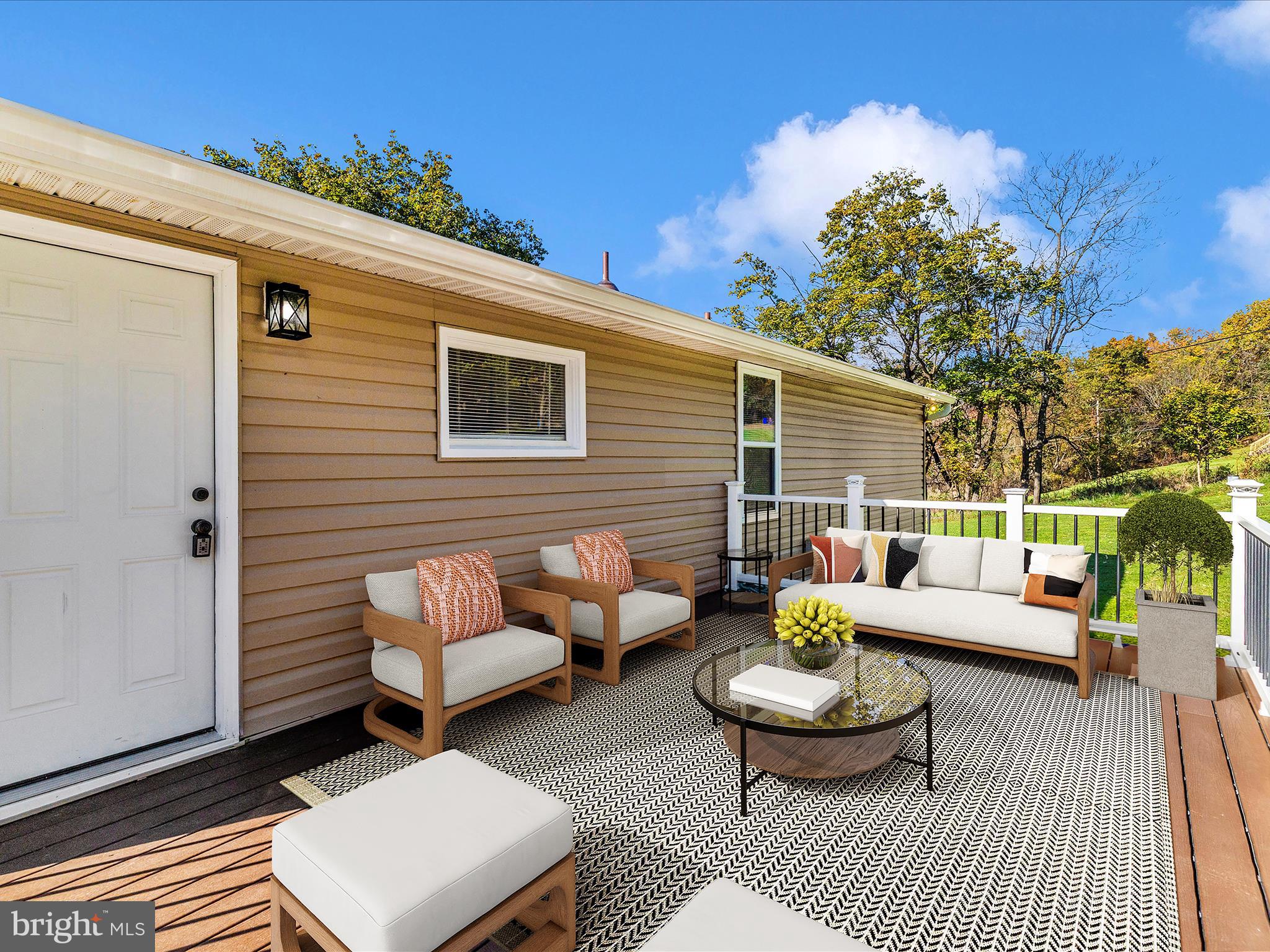1410 Woodenbridge Lane Mount Airy, MD 21771 - Photo 47 of 50 a view of a patio on the deck