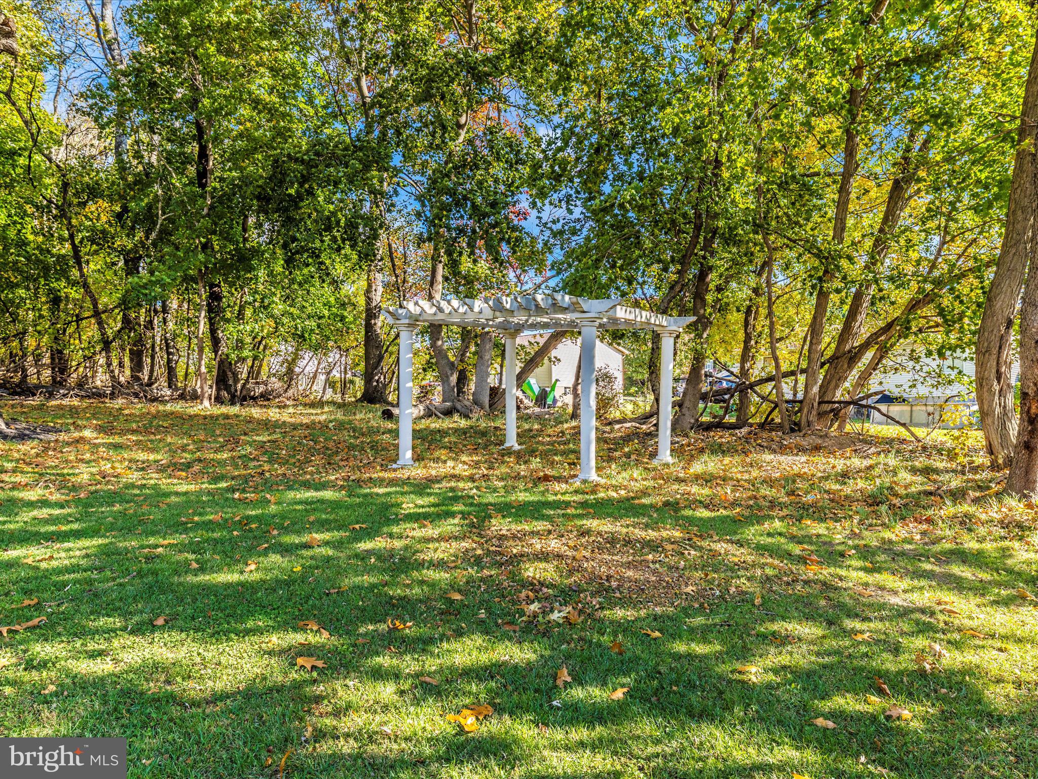 1410 Woodenbridge Lane Mount Airy, MD 21771 - Photo 49 of 50 a garden view with trees