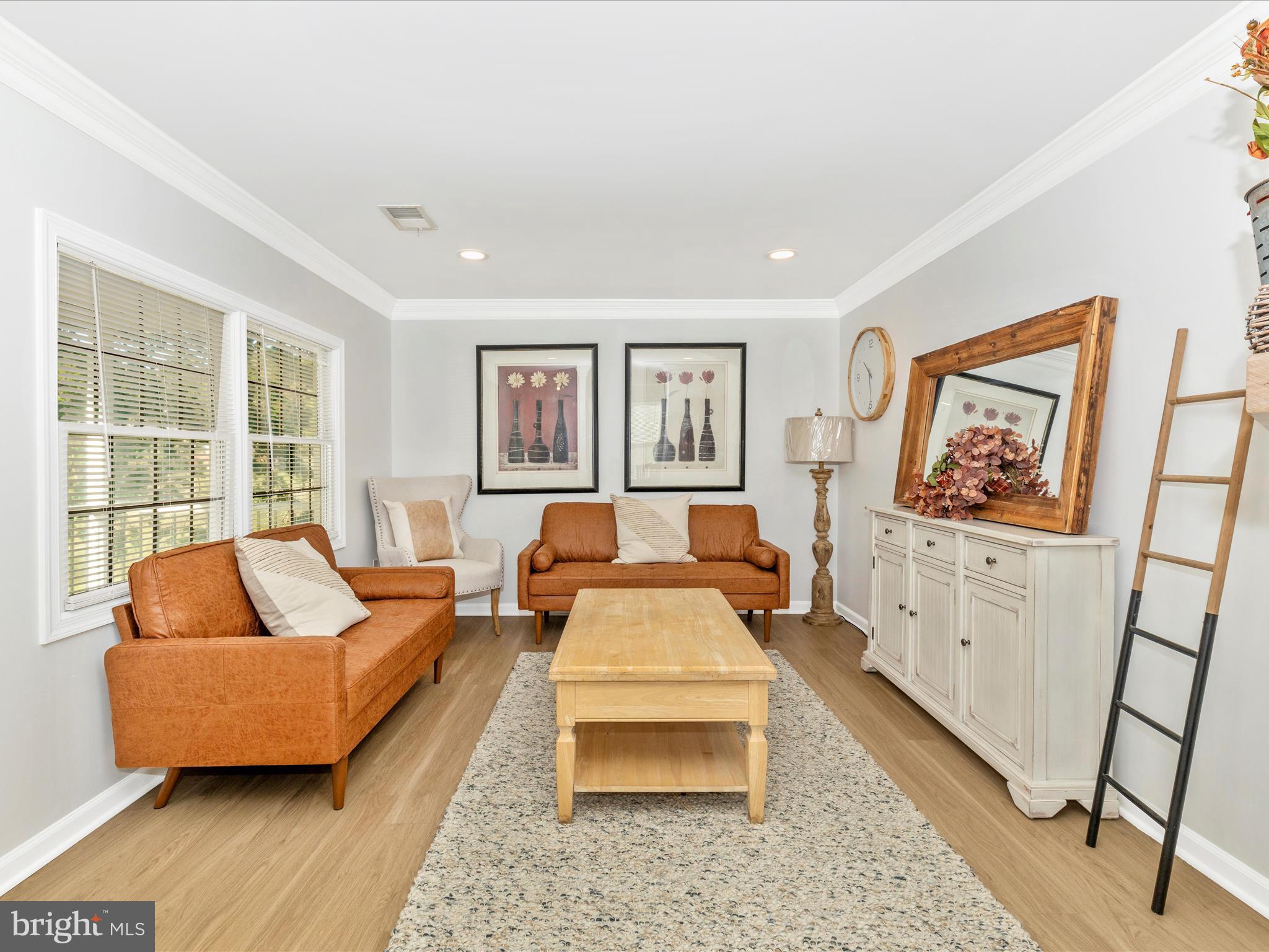 1410 Woodenbridge Lane Mount Airy, MD 21771 - Photo 6 of 50 a living room with furniture and a window