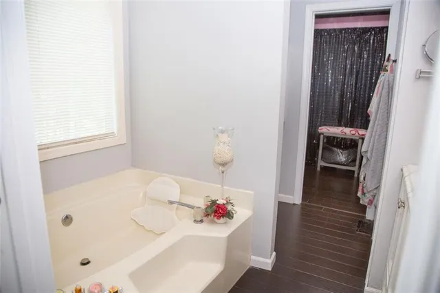 a bathroom with a sink and a window