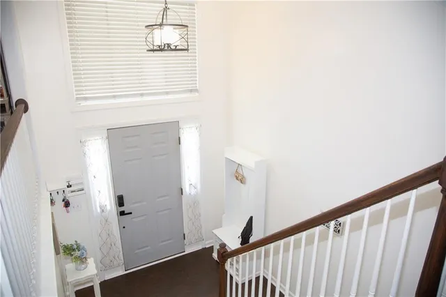 a view of a hallway with a window