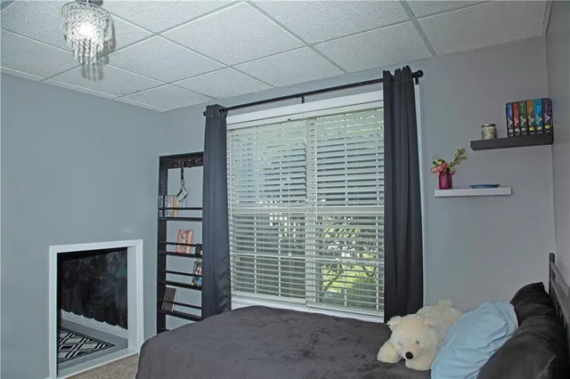 a view of livingroom with furniture and chandelier