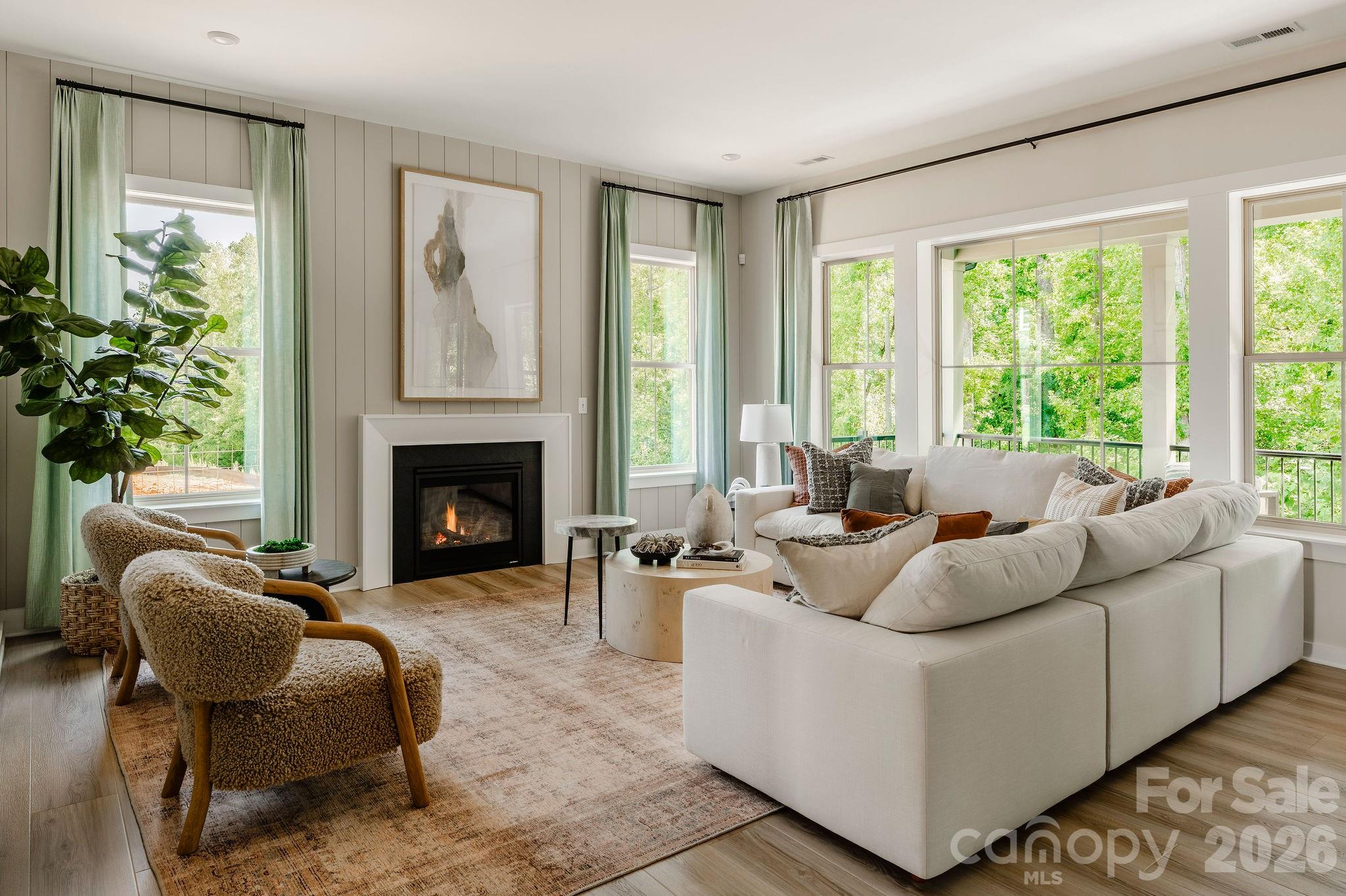 2 Pinnacle Way, Unit COVINGTON York, SC 29745 - Photo 17 of 46 a living room with furniture and a fireplace