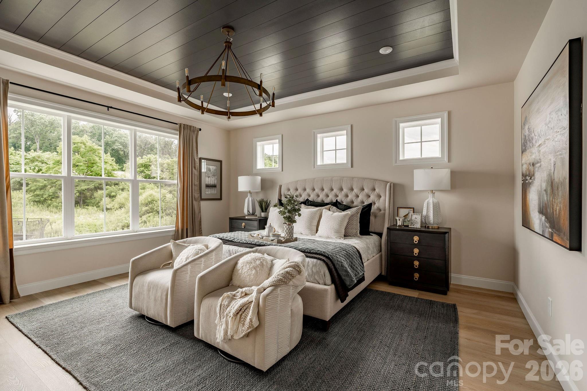 2 Pinnacle Way, Unit COVINGTON York, SC 29745 - Photo 25 of 46 a spacious bedroom with a bed a window and walk in closet