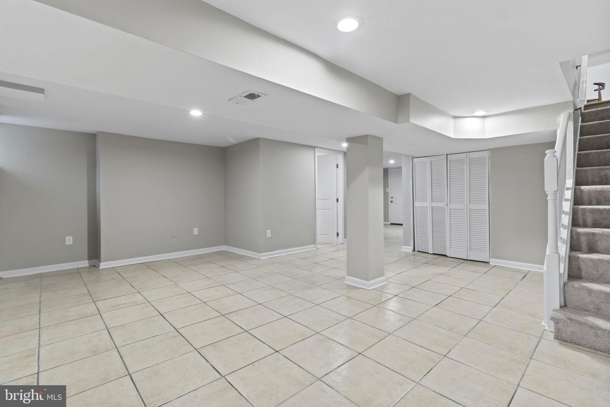 604 North Woodington Road Baltimore, MD 21229 - Photo 21 of 29 Basement with ceramic tile