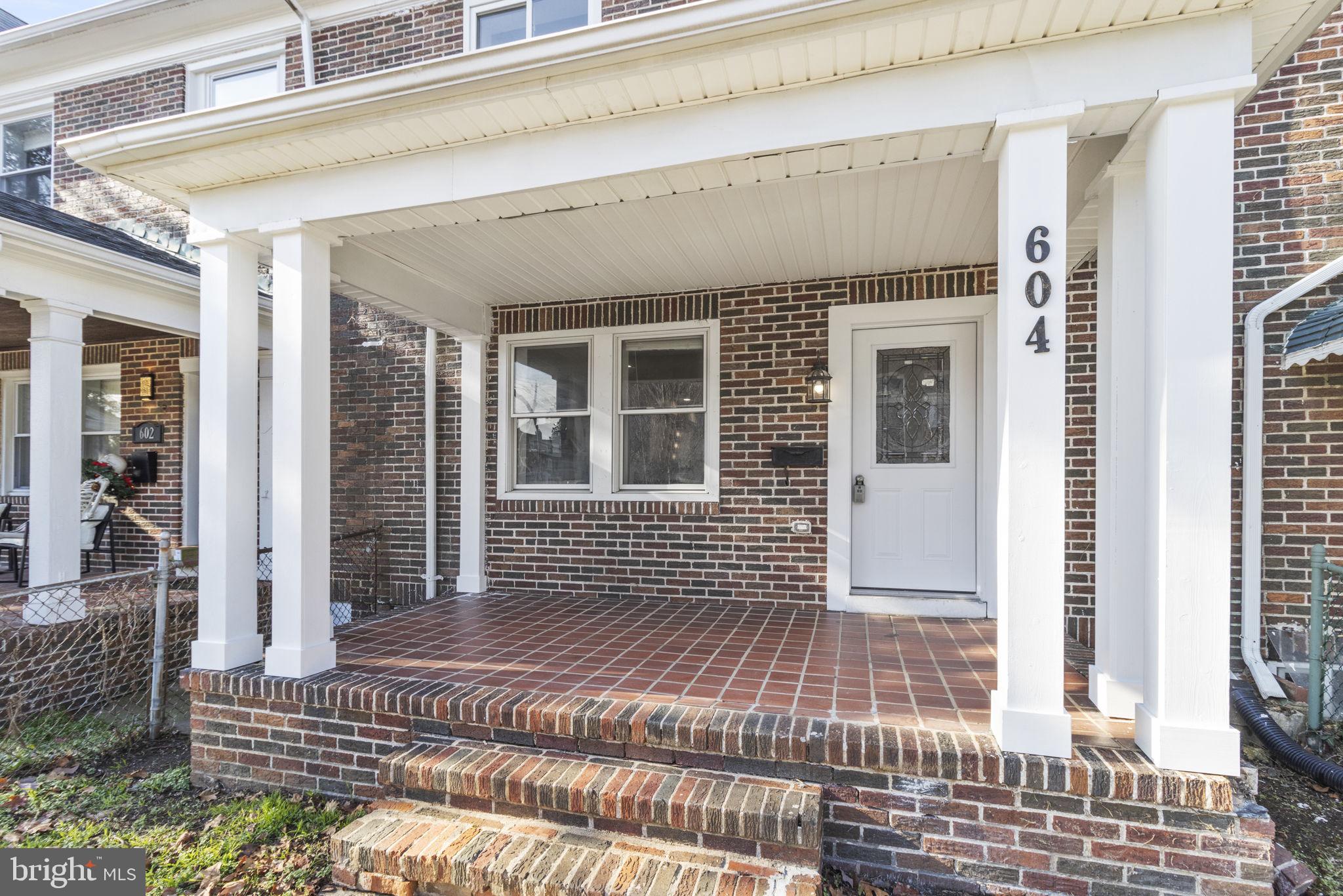 604 North Woodington Road Baltimore, MD 21229 - Photo 2 of 29 Porch front town home