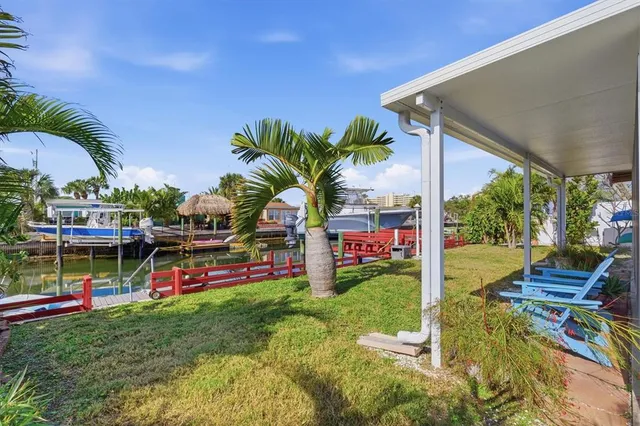 a terrace with outdoor seating and city view