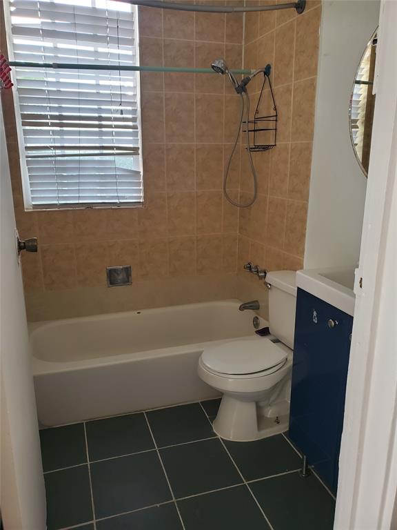 236 Northeast 28th Street, Unit 3 Miami, FL 33137 - Photo 6 of 7 a bathroom with a toilet sink and shower