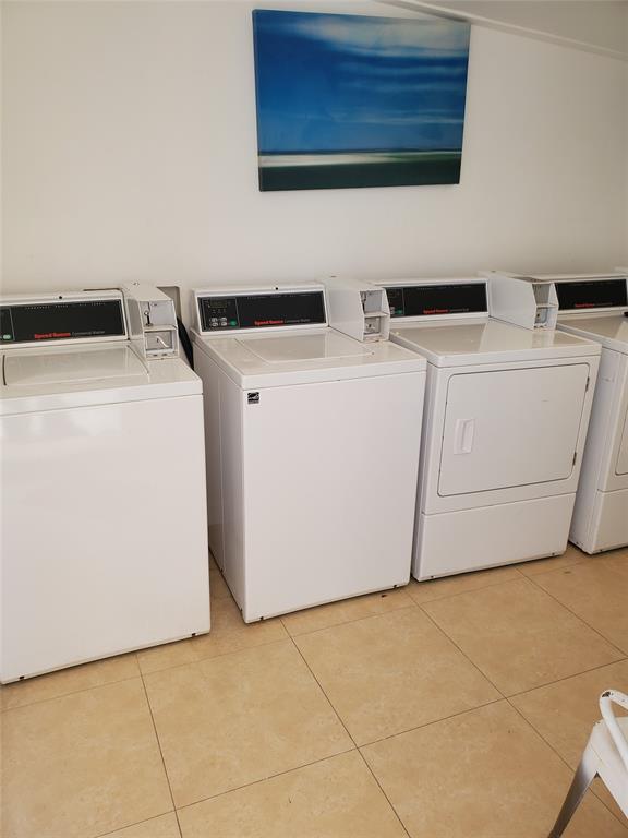 236 Northeast 28th Street, Unit 3 Miami, FL 33137 - Photo 7 of 7 a utility room with dryer and washer