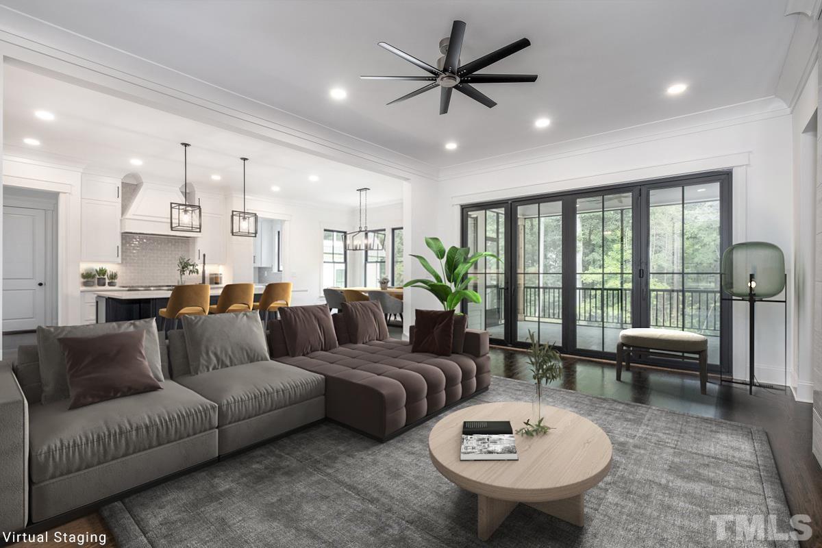 5011 Ten-Ten Road Apex, NC 27539 - Photo 21 of 49 a living room with furniture and a large window