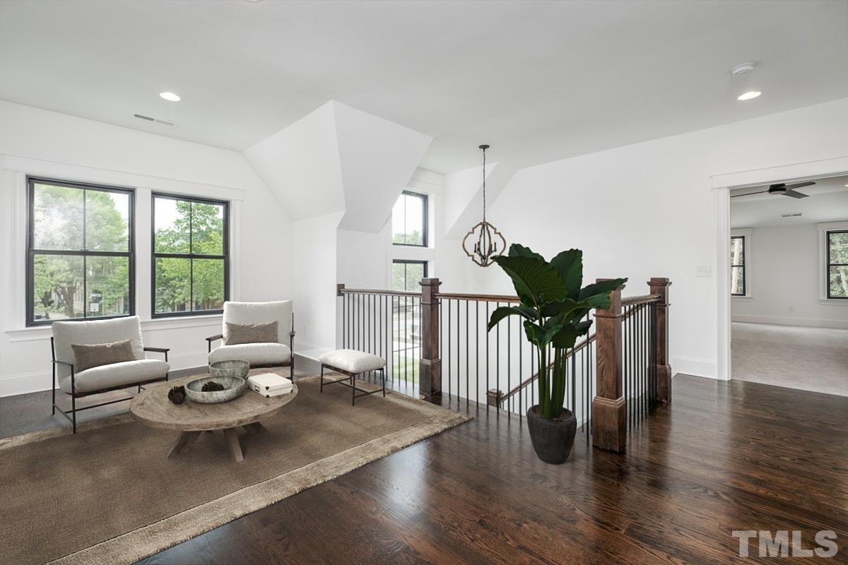 5011 Ten-Ten Road Apex, NC 27539 - Photo 35 of 49 a living room with furniture and wooden floor