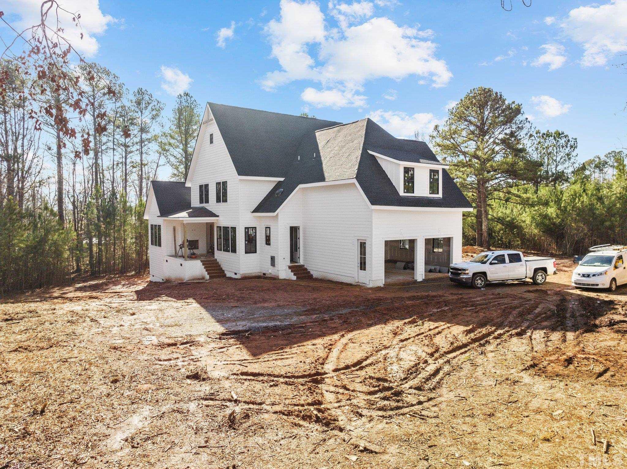 5011 Ten-Ten Road Apex, NC 27539 - Photo 43 of 49 a view of a house with snow on the road