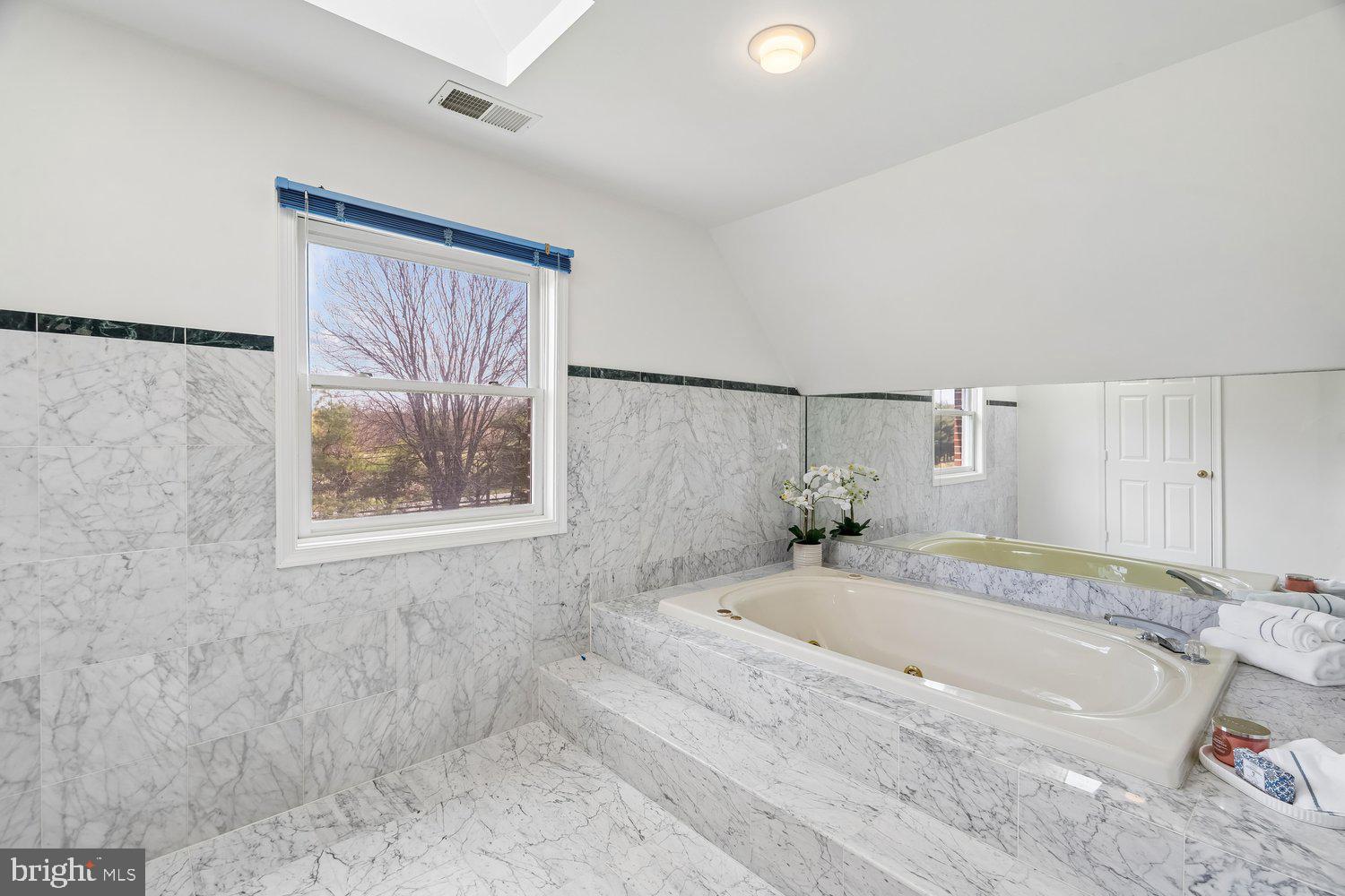 2950 Hobbs Road Glenwood, MD 21738 - Photo 35 of 82 a bathroom with a tub and a shower