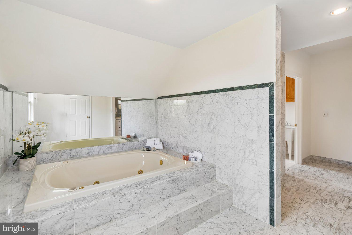 2950 Hobbs Road Glenwood, MD 21738 - Photo 36 of 82 a bathroom with a bathtub and a shower