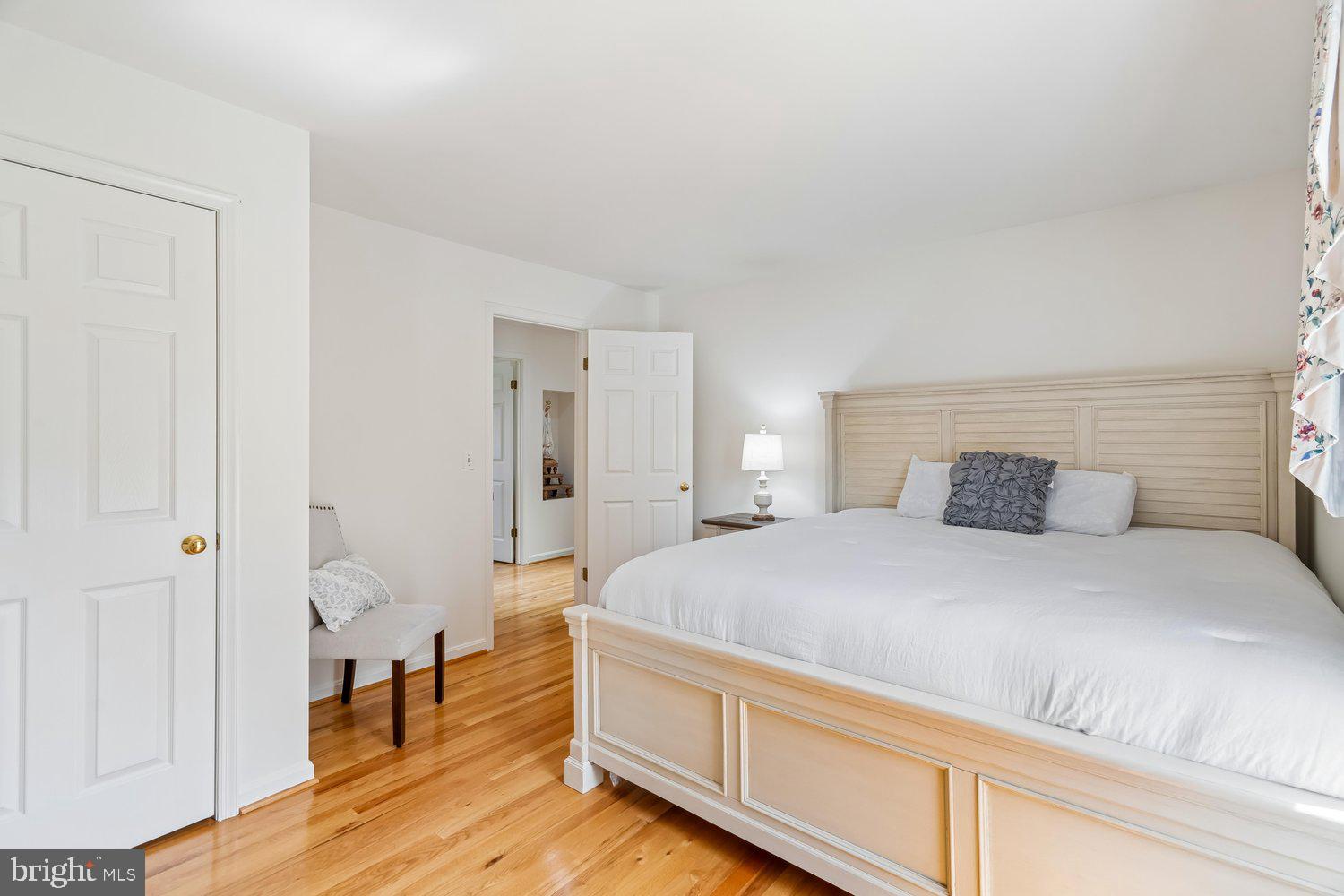 2950 Hobbs Road Glenwood, MD 21738 - Photo 39 of 82 a spacious bedroom with a bed and a table
