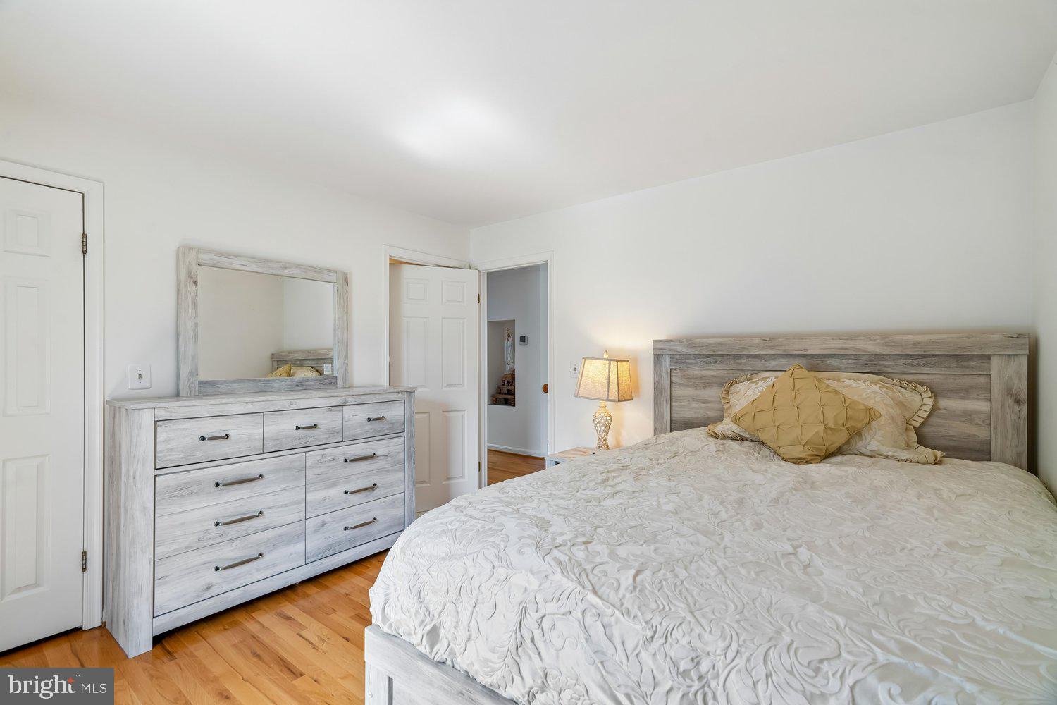 2950 Hobbs Road Glenwood, MD 21738 - Photo 41 of 82 a bedroom with a bed and a dresser