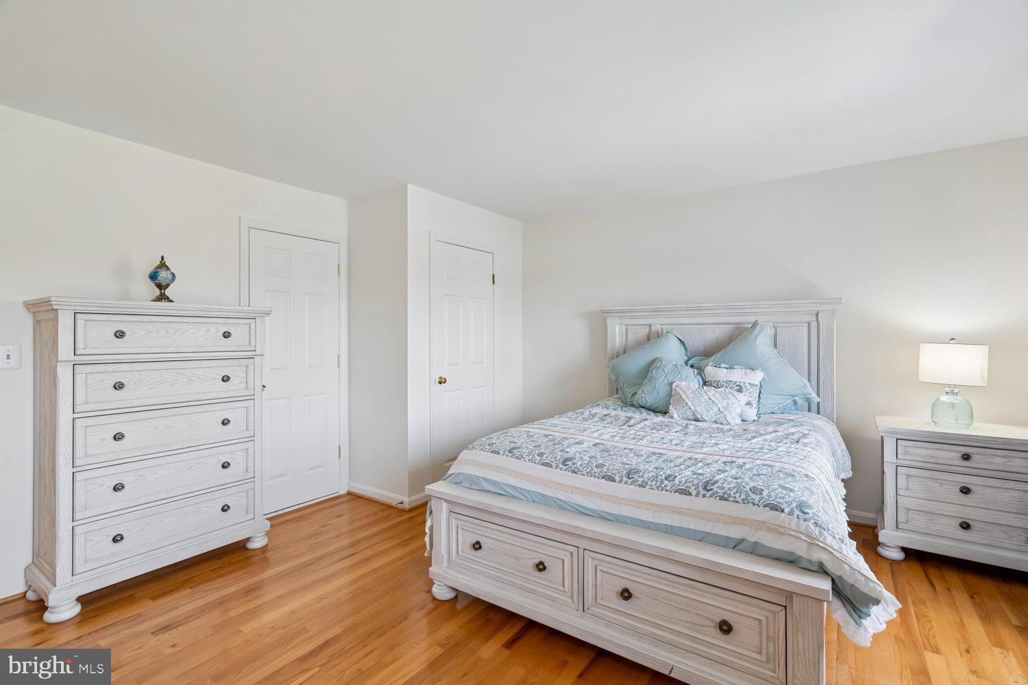 2950 Hobbs Road Glenwood, MD 21738 - Photo 44 of 82 a bedroom with a bed and a dresser
