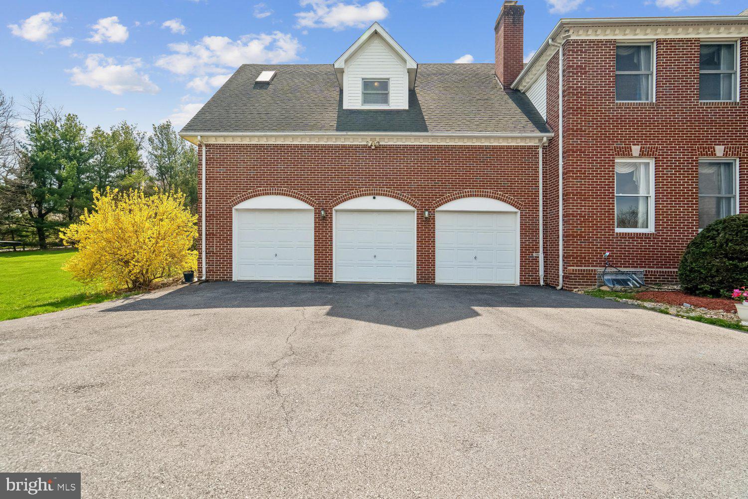 2950 Hobbs Road Glenwood, MD 21738 - Photo 69 of 82 a front view of a house with a yard and garage