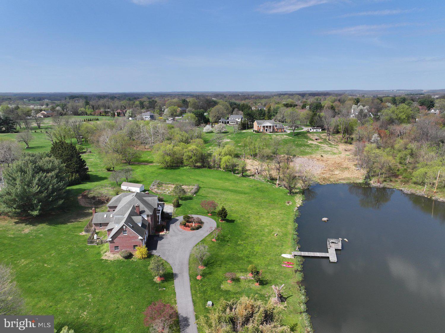 2950 Hobbs Road Glenwood, MD 21738 - Photo 74 of 82 an aerial view of a house with a yard and lake view