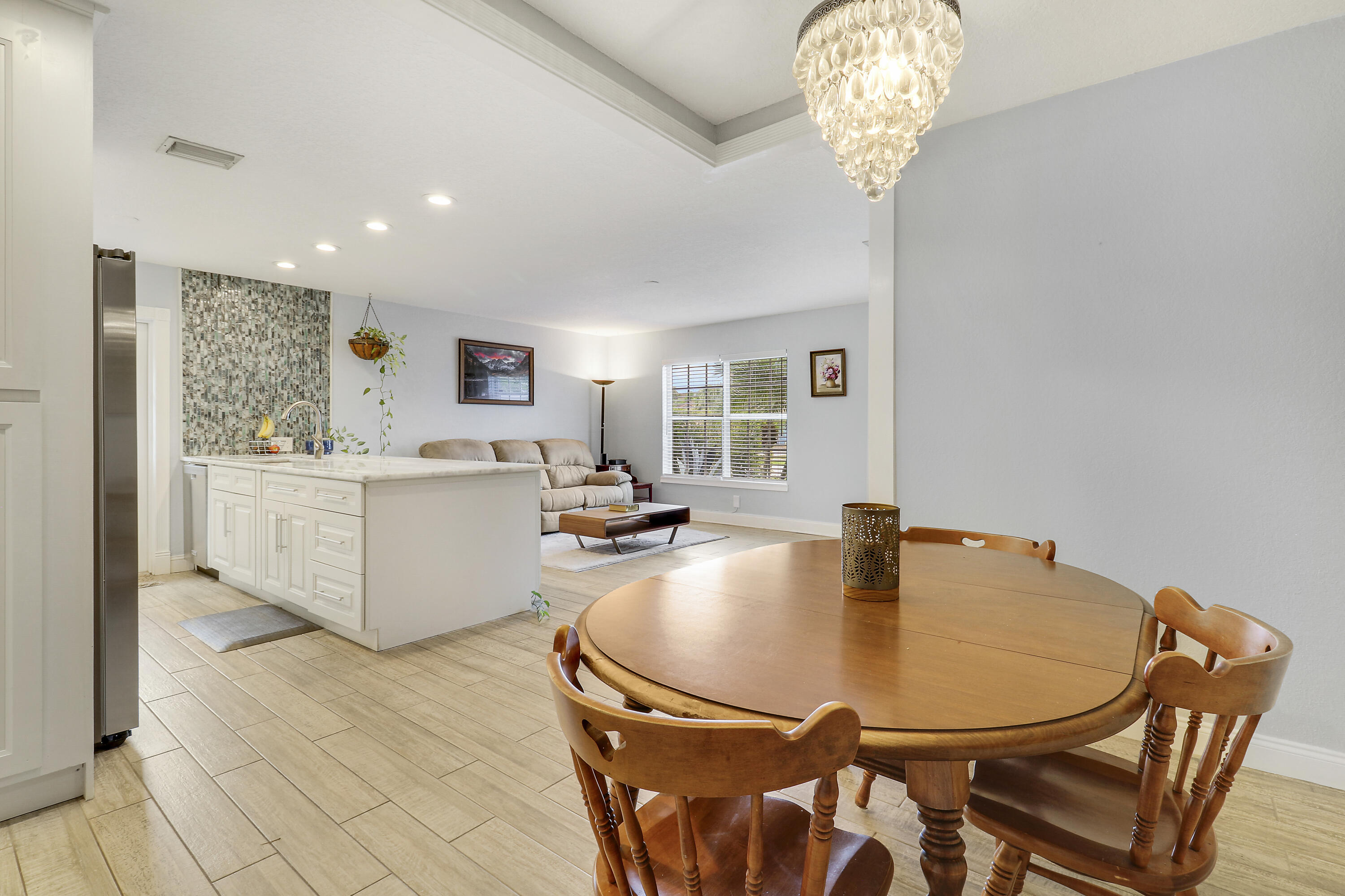 503 North Perry Avenue Jupiter, FL 33458 - Photo 25 of 32 Dining to Kitchen and Living