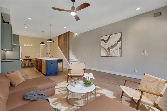 a view of a hallway with seating area
