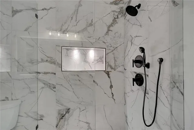 a bathroom with a sink and a shower