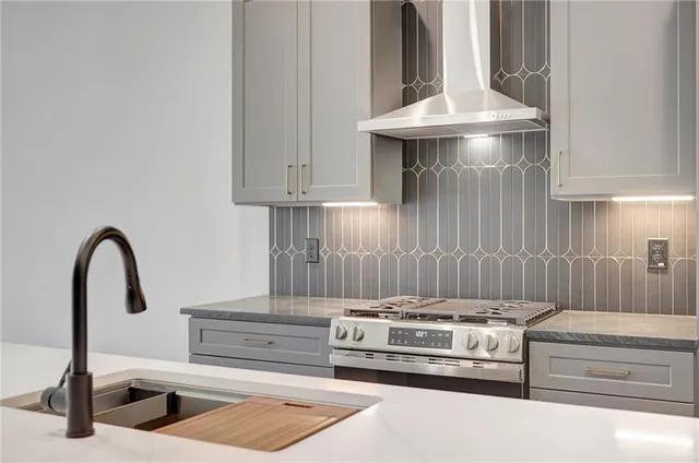 a view of kitchen with stove top oven