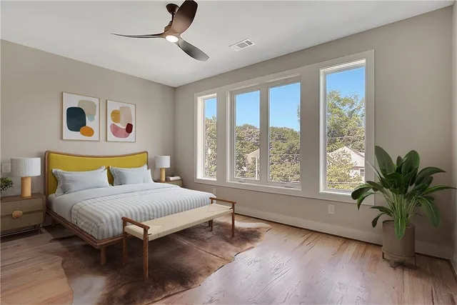 a bathroom with a granite countertop sink a toilet and bathtub