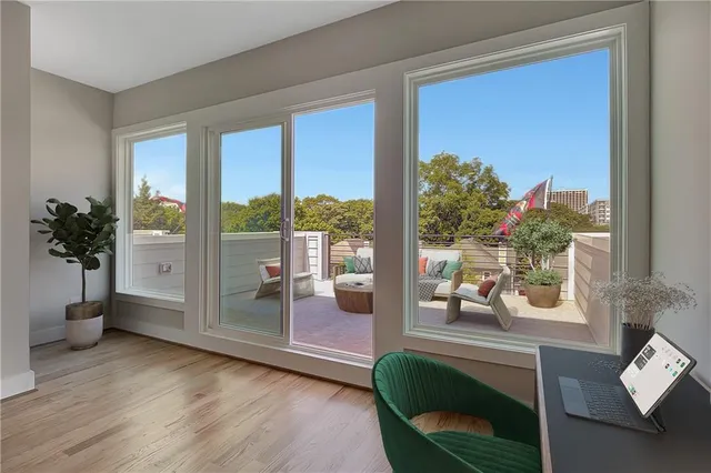 a bathroom with a granite countertop sink a toilet and a bathtub