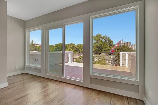 a work room with furniture and a potted plant