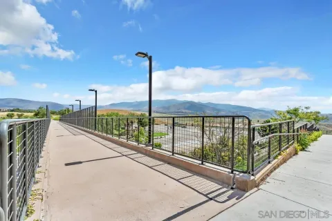 a view of a city street from a balcony