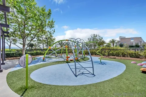 a view of a park with swings