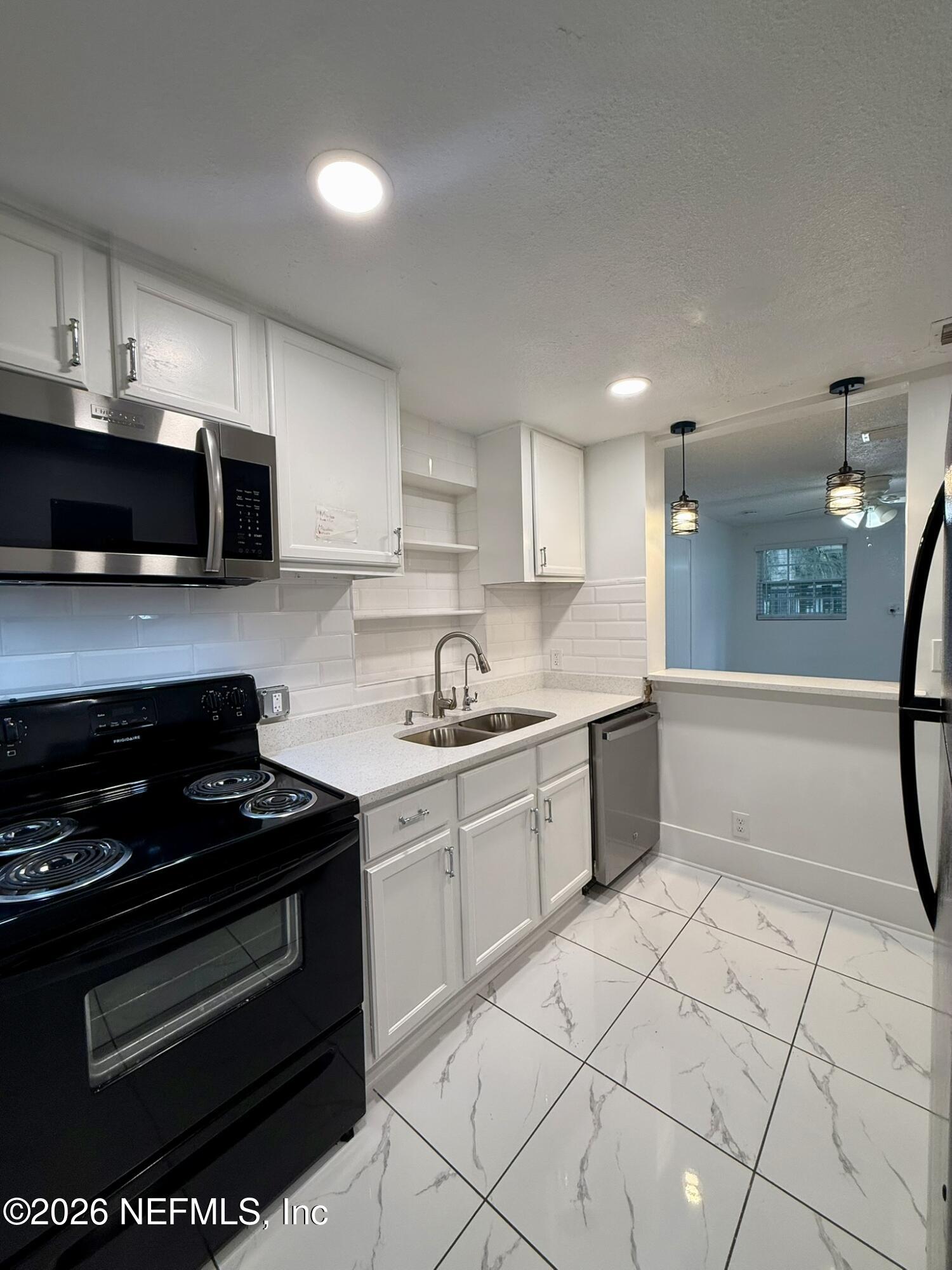 9554 Ridge Boulevard Jacksonville, FL 32208 - Photo 1 of 19 Full Kitchen