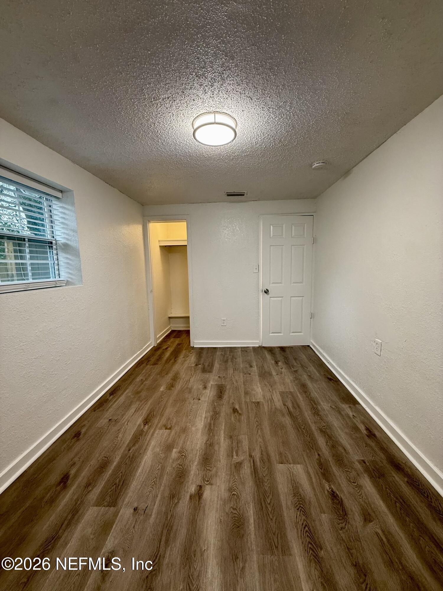 9554 Ridge Boulevard Jacksonville, FL 32208 - Photo 17 of 19 Master Bedroom
