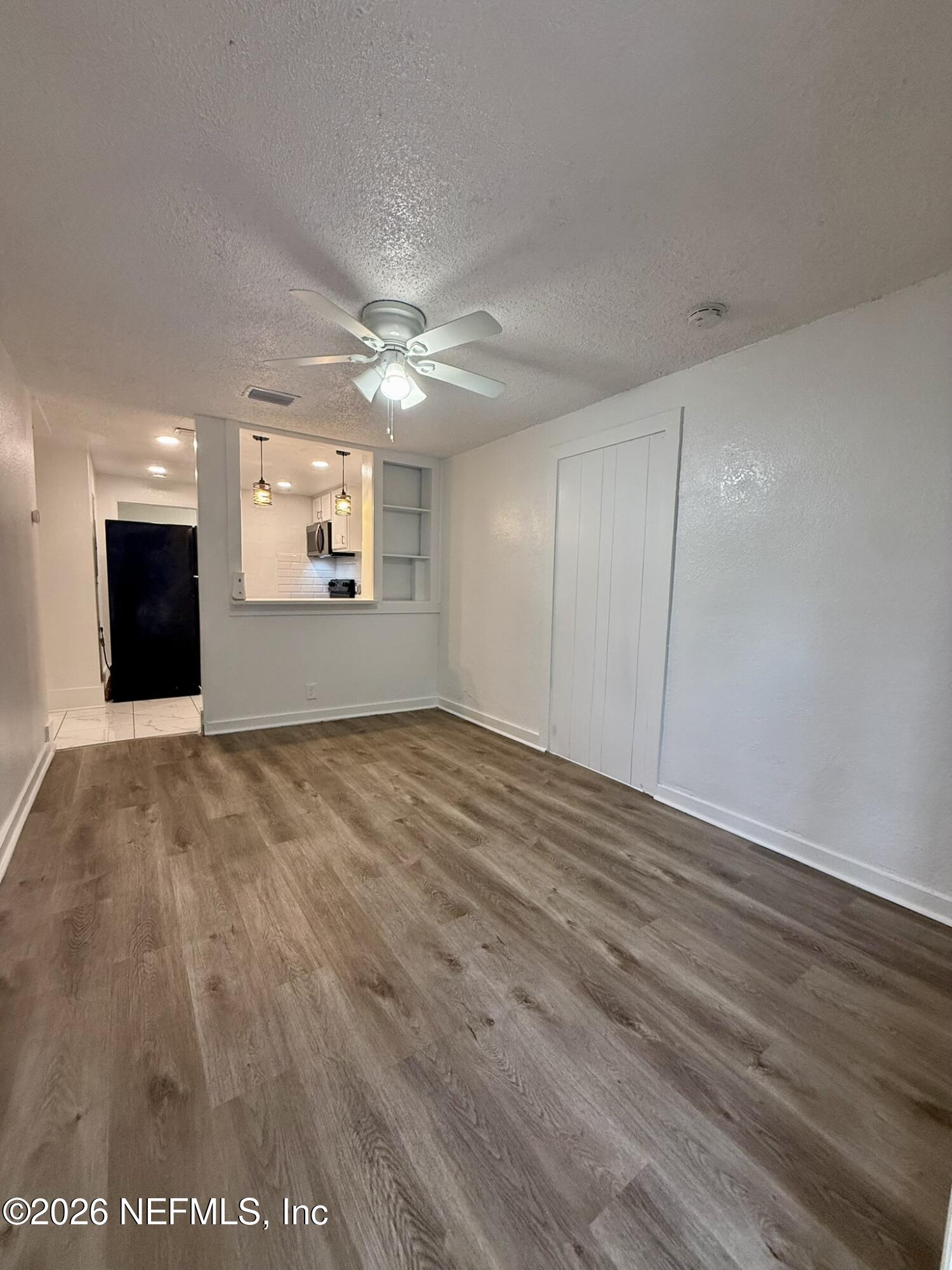 9554 Ridge Boulevard Jacksonville, FL 32208 - Photo 2 of 19 Living Room / Dinning Area