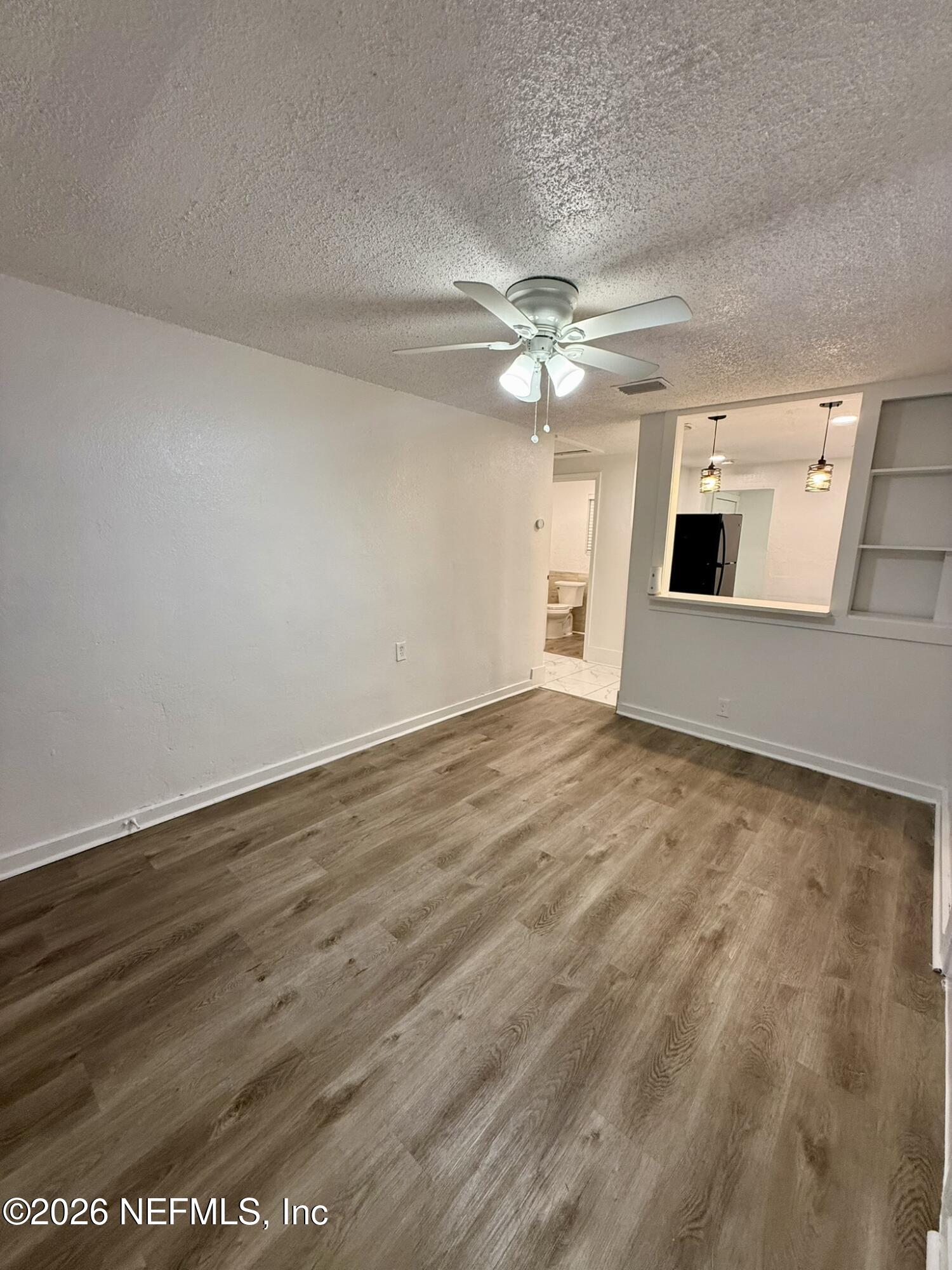 9554 Ridge Boulevard Jacksonville, FL 32208 - Photo 3 of 19 Living Room / Dinning Area