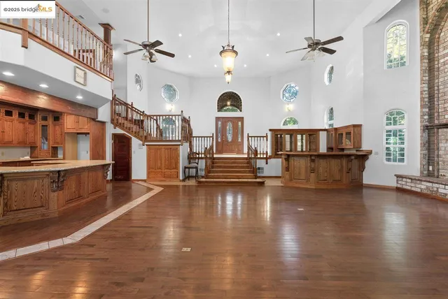 a view of a entryway with wooden floor