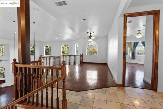 a bathroom with a sink vanity and a mirror