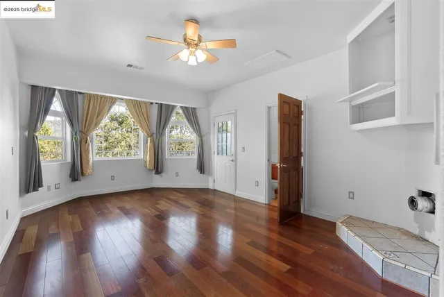a spacious bathroom with a bathtub and a window