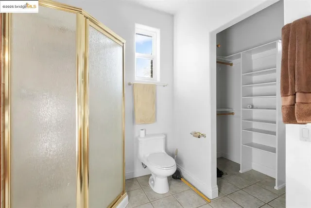 a view of game room with windows