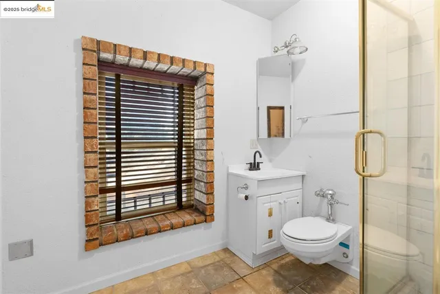 a bathroom with a sink and a toilet