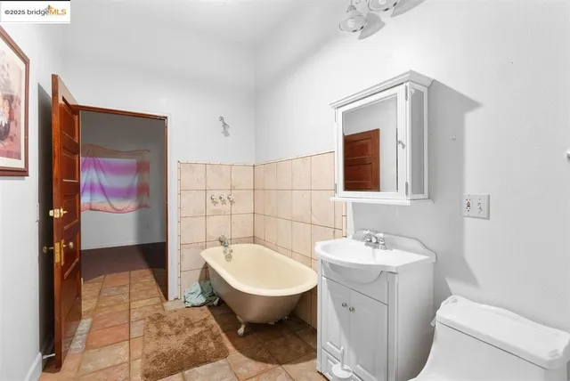 a view of a backyard with sitting area